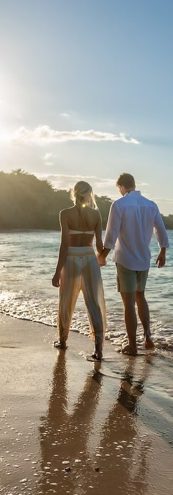 Couple enjoying honeymoon on a Caribbean Beach.